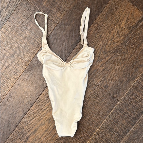 SKIMS Seamless Sculpt Thong Bodysuit in Nude - Picture 3 of 8